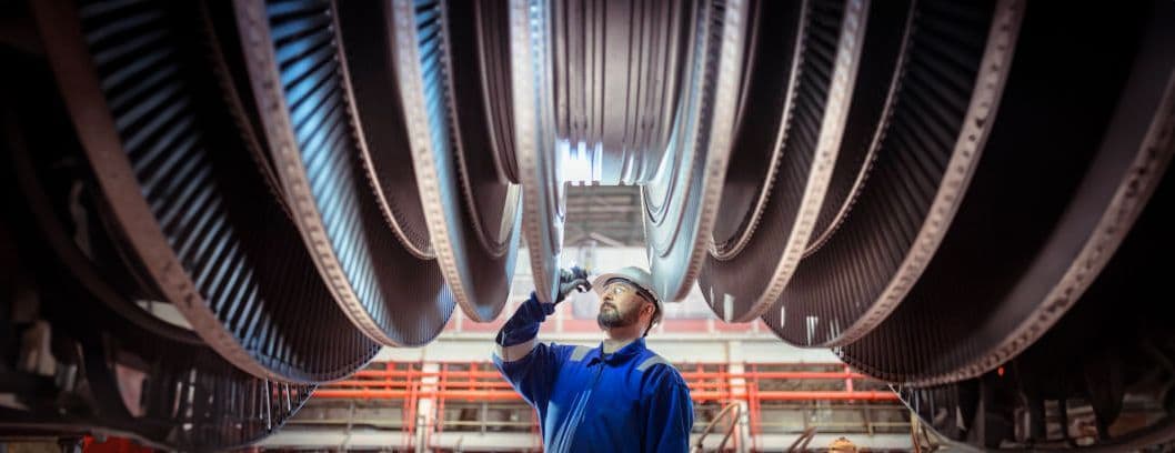 Man working on engines